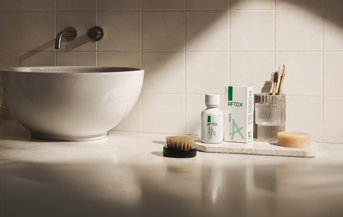Immagine che rappresenta aftox sul ripiano di un bagno