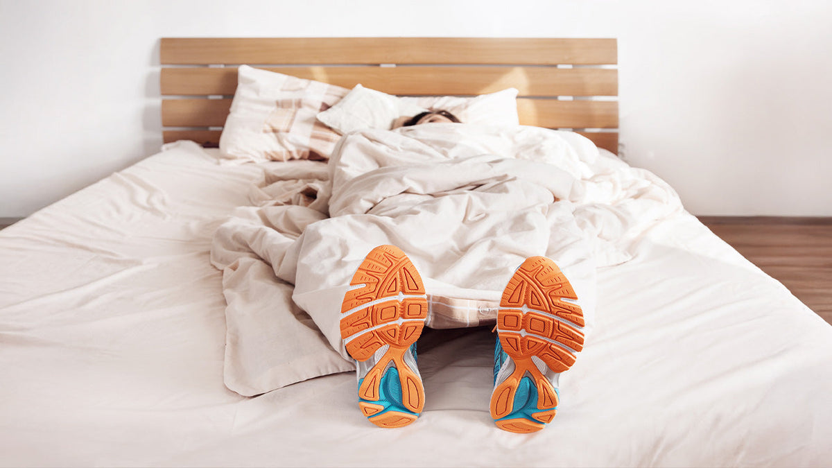 Immagine che raffigura una sportiva a letto mentre dorme