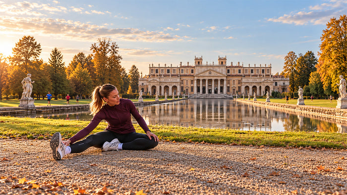 Immagine che raffigura una donna che si riscalda prima di allenarsi